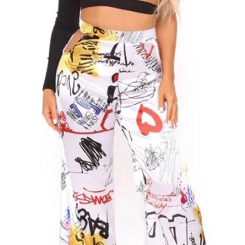 ❤️NWT FASHION NOVA FUN CUT OUT SATIN GRAFFITI PANTS.